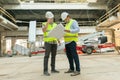 Group of engineers, builders, architects on the building site. Construction, development, teamwork and people concept Royalty Free Stock Photo