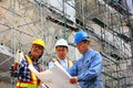 Group of engineers working in construction site