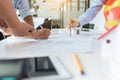 Group of engineers working together to plan the project at the meeting Royalty Free Stock Photo