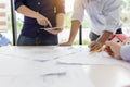 Group of engineers working together to plan the project at the meeting Royalty Free Stock Photo