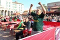 Group of enthusiastic Springbok rugby sports fans at outdoor broadcast location