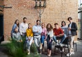 Group of entrepreneurs looking at camera indoors in office, inclusion of disabled ceoncept.