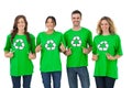 Group of environmental activists pointing their tshirt