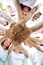 Group of environmentalists stacking hands Royalty Free Stock Photo