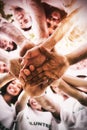 Group of environmentalists stacking hands Royalty Free Stock Photo