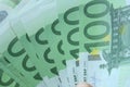 Group of 100 euro notes. Euro banknotes close up. Several hundred euro banknotes Royalty Free Stock Photo