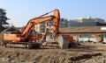 Group of excavators in the construction site during groundworks