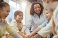 Group of Excited Children Huddling