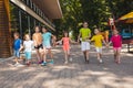 The group of excited preschoolers are running together Royalty Free Stock Photo