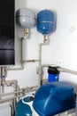 Group of expansion tanks in house boiler room Royalty Free Stock Photo