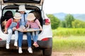 Group family children travel on car for adventure nature in vacations.