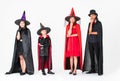 Group of family in fancy costume multiple style on white background. Concept for funny activity in halloween festival Royalty Free Stock Photo