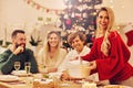 Group of family and friends celebrating Christmas dinner Royalty Free Stock Photo