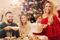 Group of family and friends celebrating Christmas dinner Royalty Free Stock Photo