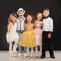 Group of fashionable kids in celebratory clothes Royalty Free Stock Photo
