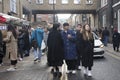 Group of fashionably dressed people posing on Brick Lane Royalty Free Stock Photo