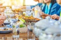 Group of female friends enjoy eating with acacia pennata omelette sour soup in fish shape hot pot in the restaurant. Royalty Free Stock Photo