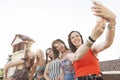 Group of female friends taking a selfie with smarthphone