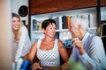 Group of female office workers are chatting while working together at workplace. Business, office, job Royalty Free Stock Photo