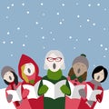 Female christmas carol singers in the snow Royalty Free Stock Photo