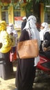 Group of female teachers waiting for doctors at covid hospital