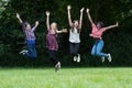 Group Of Female Teenage Friends Jumping In The Air Royalty Free Stock Photo