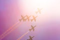 Group of fighters in the sky in the violet sunshine lighted up