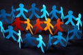 Group of figures of one color surrounded by figures by another color. Royalty Free Stock Photo