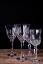 Group of finely chiseled alcohool glasses, close up with black b Royalty Free Stock Photo