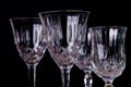 Group of finely chiseled alcohool glasses, close up with black b Royalty Free Stock Photo