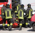Group of firefighters working as a perfect teamwork Royalty Free Stock Photo