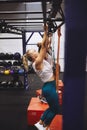 People working out with resistance bands during a gym class Royalty Free Stock Photo