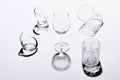 Group of five glasses on white background