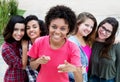 Group of five happy young adult women