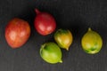 Fresh tomato de barao on grey stone Royalty Free Stock Photo