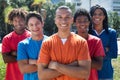 Group of five young men with crossed arms Royalty Free Stock Photo