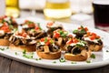 group of flavored mushroom bruschetta on a white plate Royalty Free Stock Photo