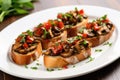 group of flavored mushroom bruschetta on a white plate Royalty Free Stock Photo