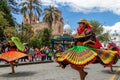A group of folk dancers from Cayambe, Ecuador, in historical center of Cuenca