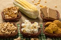 Group of food of Festa Junina in wicker baskets, typical brazilian party: Peanut, Cookie, Popcorn, Pe de Moleque, Pacoca, Corn.