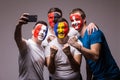 Group of football fans of their national team taking selfie photo Royalty Free Stock Photo