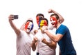 Group of football fans of their national team taking selfie photo Royalty Free Stock Photo