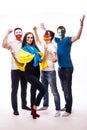 Group of football fans their national team: Ukraine, Germany, Poland, Northern Ireland take selfie Royalty Free Stock Photo