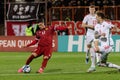 Group of football players in a match between Armenia and Wales in a field in Erevan, Armenia