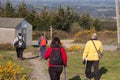 Group of four adult people following the Santiago Way near CoruÃÂ±a,