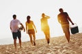 Group four friends beach picknik sunset sea Royalty Free Stock Photo