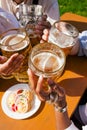 Group of four friends drinking beer