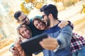 Group of four funny friends taking selfie Royalty Free Stock Photo