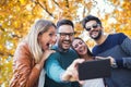 Group of four funny friends taking selfie Royalty Free Stock Photo