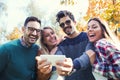 Group of four funny friends taking selfie Royalty Free Stock Photo